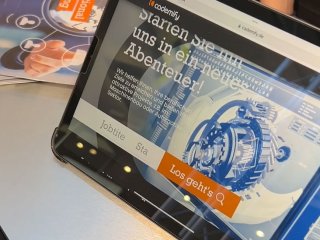Standpersonal auf der Messe