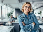 young friendly woman in a modern meeting room