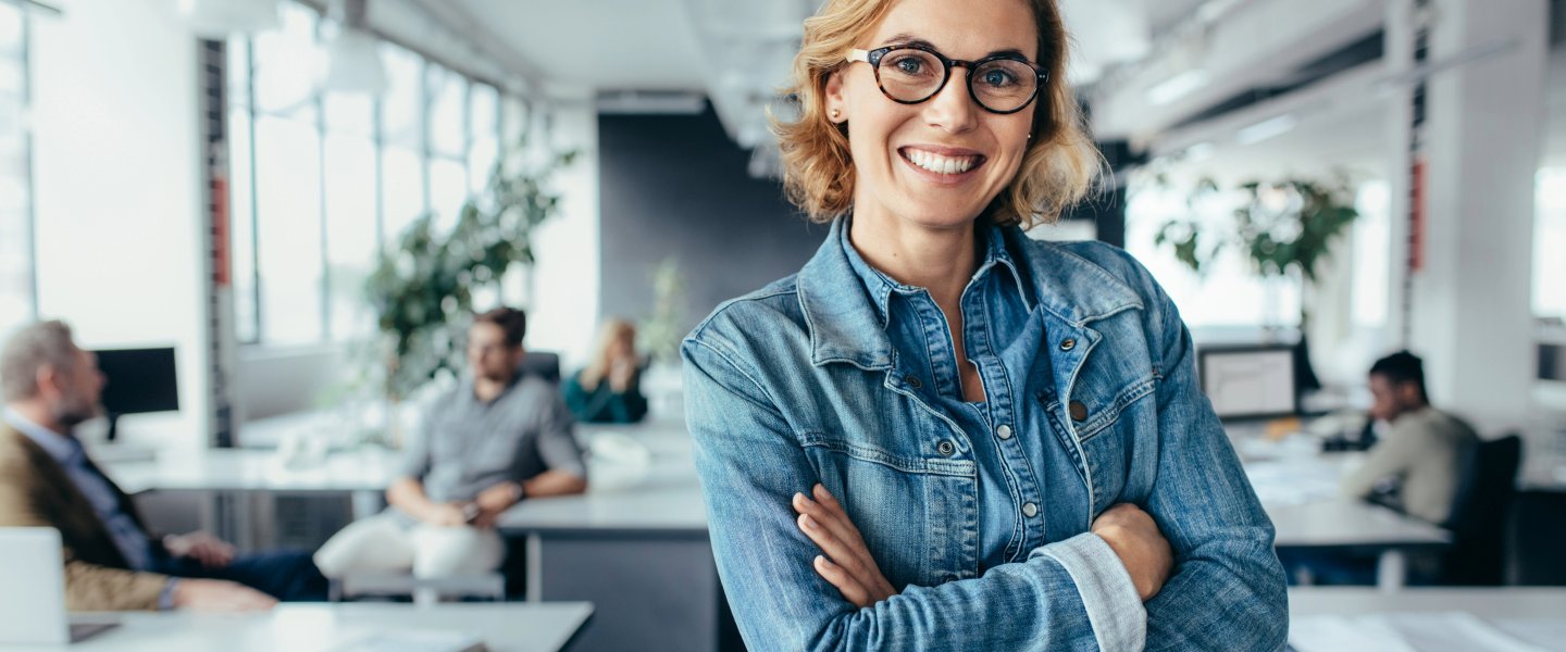 young friendly woman in a modern meeting room