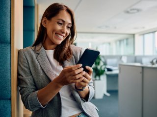 Experienced professional women looking at her phone