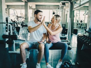 man and woman doing sports